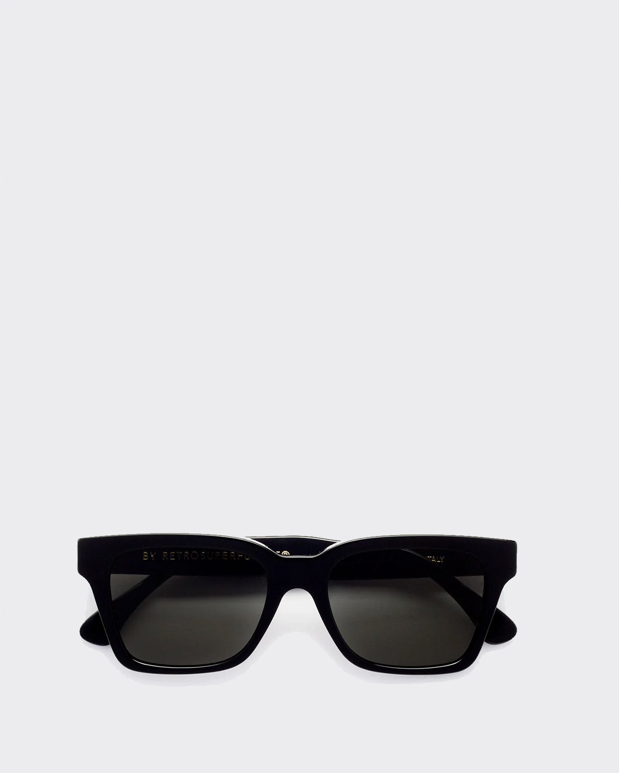 Black sunglasses on a light gray background