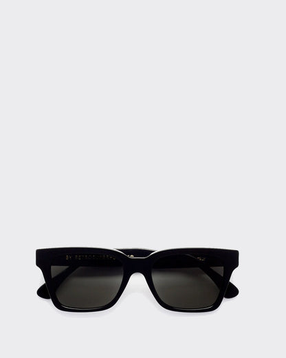 Black sunglasses on a light gray background
