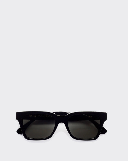 Black sunglasses on a light gray background