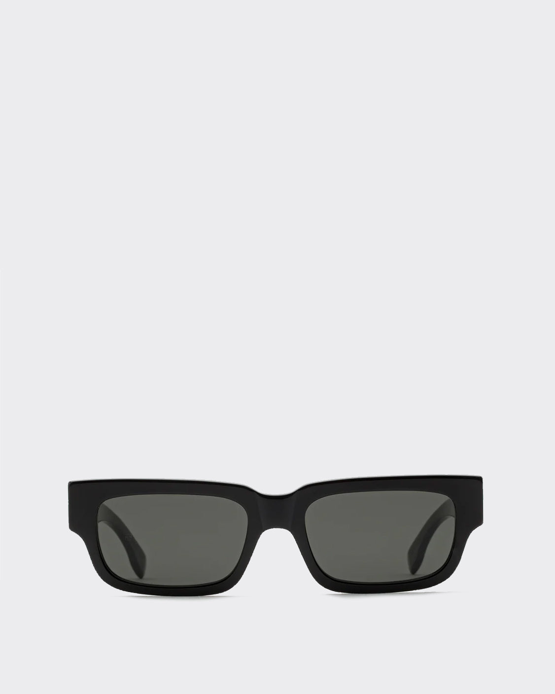 Black sunglasses with dark lenses on a white background