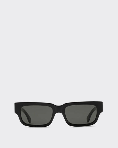 Black sunglasses with dark lenses on a white background