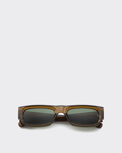 Sunglasses with a brown frame and dark lenses on a light gray background