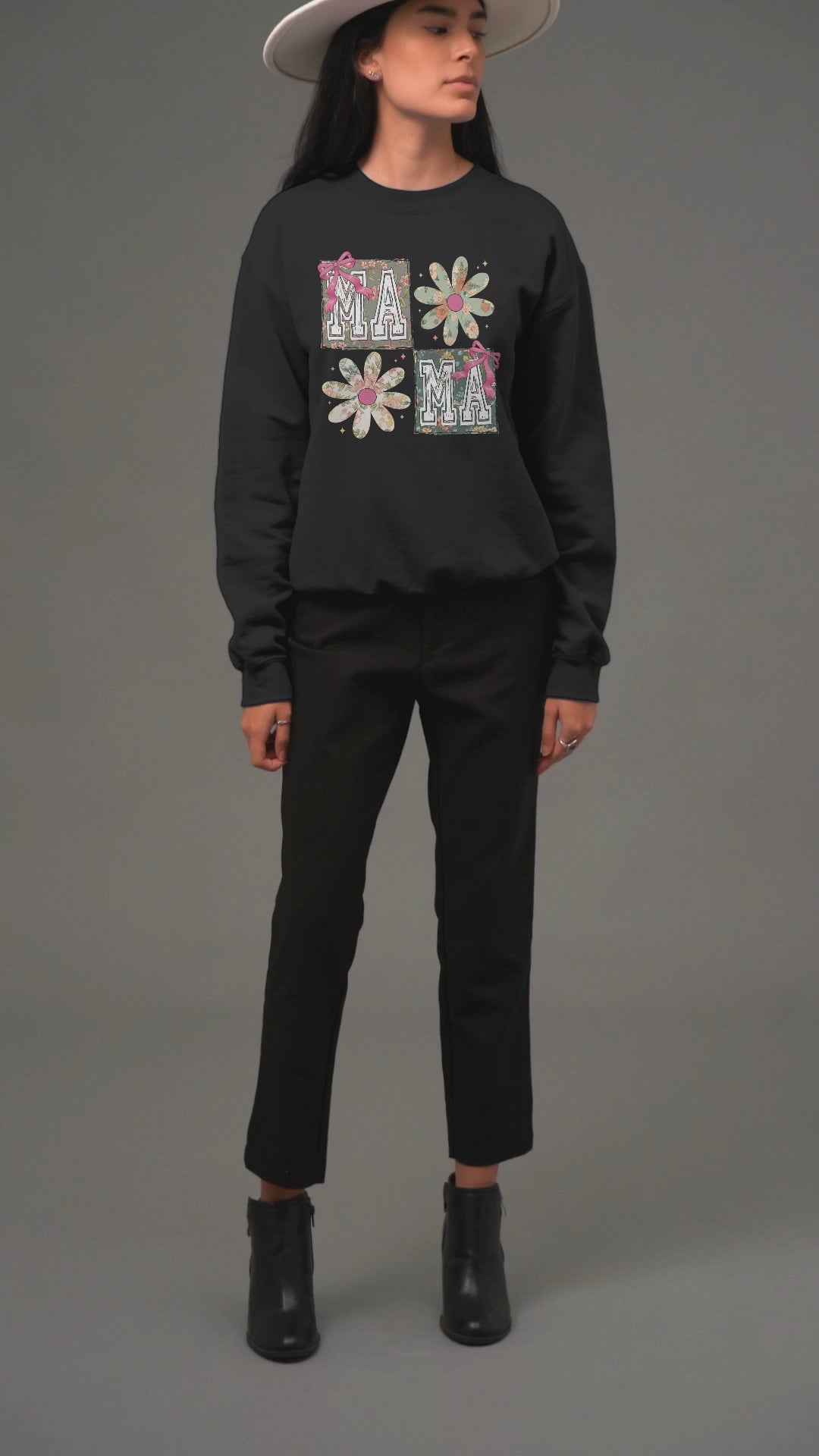 video-of-a-woman-wearing-a-crewneck-sweatshirt-and-a-hat-in-a-studio-5809v